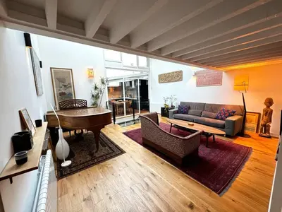 Coin salon dans l'établissement The Pianist - House Loft - Heart of Montparnasse