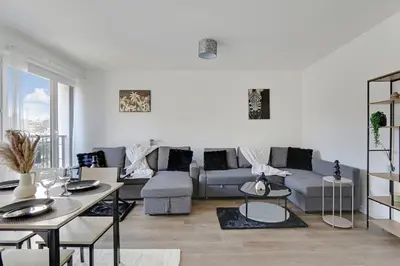 Coin salon dans l'établissement Studio spacieux à 2 minutes de Paris - 4 personnes
