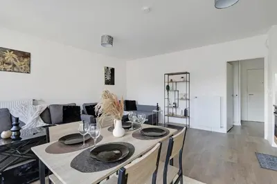 Coin salon dans l'établissement Studio spacieux à 2 minutes de Paris - 4 personnes