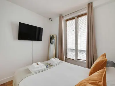 Un ou plusieurs lits dans un hébergement de l'établissement Charming Apartment - Mobility Lease