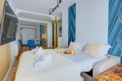 Un ou plusieurs lits dans un hébergement de l'établissement COSY Appartement Paris Centre