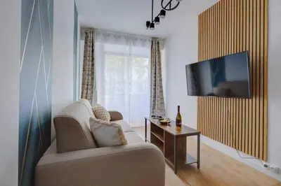 Télévision ou salle de divertissement dans l'établissement COSY Appartement Paris Centre