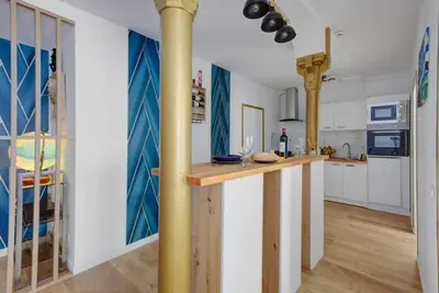 Cuisine ou kitchenette dans l'établissement COSY Appartement Paris Centre
