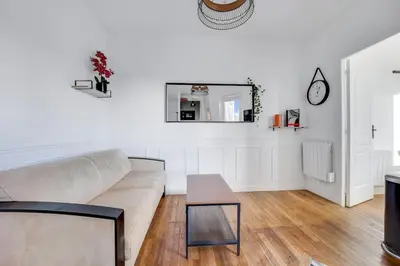 Cuisine ou kitchenette dans l'établissement Appartement neuf à 20 des Champs Élysées