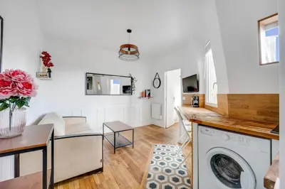 Cuisine ou kitchenette dans l'établissement Appartement neuf à 20 des Champs Élysées