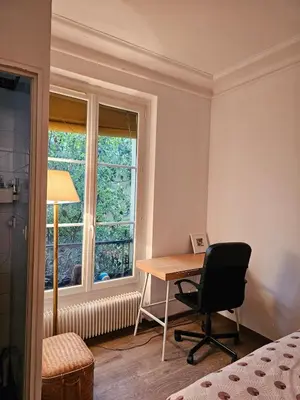 Un ou plusieurs lits dans un hébergement de l'établissement Buttes Chaumont apartement
