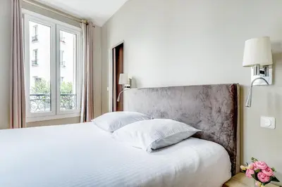 Un ou plusieurs lits dans un hébergement de l'établissement AC & 10min from Marais l Center of Paris