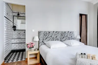 Un ou plusieurs lits dans un hébergement de l'établissement AC & 10min from Marais l Center of Paris