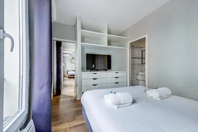 Un ou plusieurs lits dans un hébergement de l'établissement AC & 10min from Marais & Fully equipped