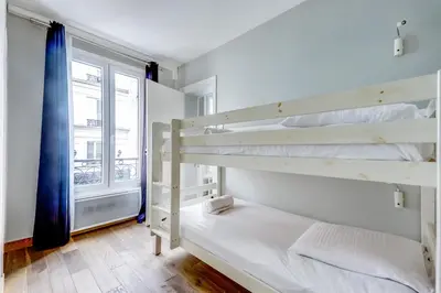 Un ou plusieurs lits dans un hébergement de l'établissement AC & 10min from Marais & Fully equipped