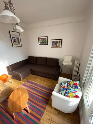 Coin salon dans l'établissement Appartement de charme F2, Porte St Cloud