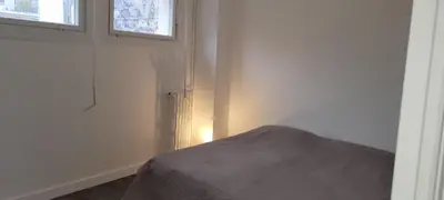 Un ou plusieurs lits dans un hébergement de l'établissement 3 bedrooms apartment Paris 16 - Michel Ange
