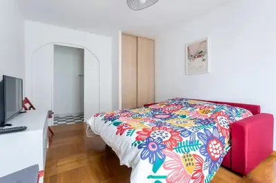 Un ou plusieurs lits dans un hébergement de l'établissement Cosy, Montparnasse-Pte Versailles-Tour Eiffel