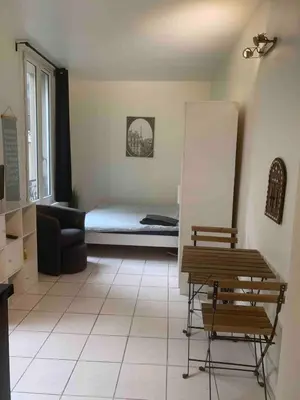 Un ou plusieurs lits dans un hébergement de l'établissement Entire Studio - Arena La Chapelle