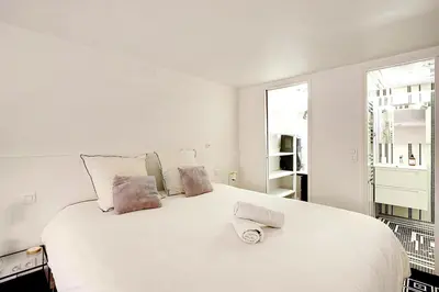 Un ou plusieurs lits dans un hébergement de l'établissement Appartement Montmartre