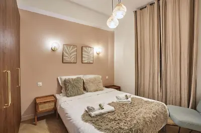 Un ou plusieurs lits dans un hébergement de l'établissement Sublime flat Paris Bois de Vincennes by Studio prestige