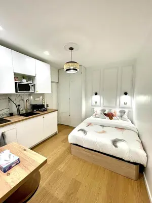 Un ou plusieurs lits dans un hébergement de l'établissement Apartment - Paris 11th