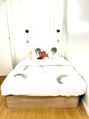 Un ou plusieurs lits dans un hébergement de l'établissement Apartment - Paris 11th