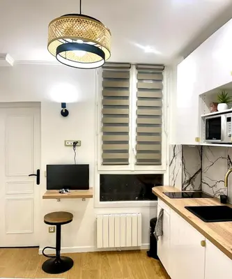 Cuisine ou kitchenette dans l'établissement Apartment - Paris 11th