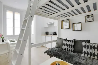 Coin salon dans l'établissement Cosy Apartement in heart of Batignolles