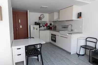 Cuisine ou kitchenette dans l'établissement Cozy apartment in Le Marais