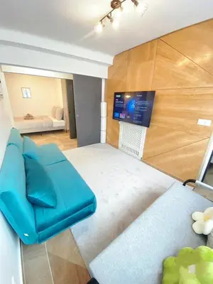 Télévision ou salle de divertissement dans l'établissement 3 BR With AC- Opéra Garnier -Galeries Lafayette