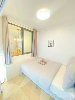 Un ou plusieurs lits dans un hébergement de l'établissement 3 BR With AC- Opéra Garnier -Galeries Lafayette