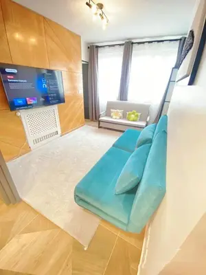 Télévision ou salle de divertissement dans l'établissement 3 BR With AC- Opéra Garnier -Galeries Lafayette