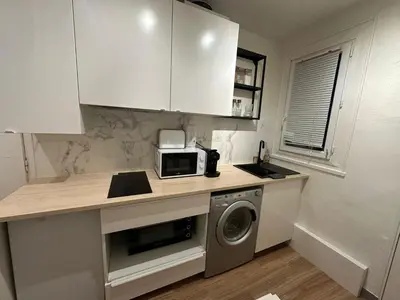 Cuisine ou kitchenette dans l'établissement Lumineux et agréable