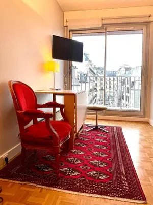 Télévision ou salle de divertissement dans l'établissement Parc Monceau - Chez Amélie