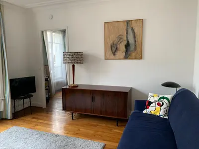 Télévision ou salle de divertissement dans l'établissement Appartement vue sur la tour Eiffel