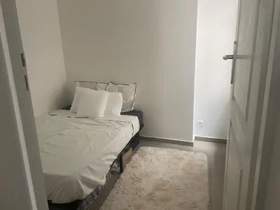 Un ou plusieurs lits dans un hébergement de l'établissement appartement au centre de Paris, 2ème arrondissement