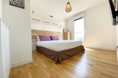 Un ou plusieurs lits dans un hébergement de l'établissement Appartement 3 pièces avec parking 8 people