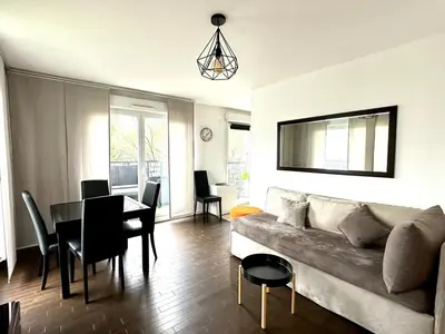 Coin salon dans l'établissement Appartement 3 pièces avec parking 8 people