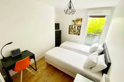 Un ou plusieurs lits dans un hébergement de l'établissement Appartement 3 pièces avec parking 8 people