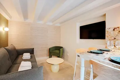 Coin salon dans l'établissement Chic and Cosy Apartment-Canal Saint Martin