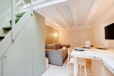 Coin salon dans l'établissement Chic and Cosy Apartment-Canal Saint Martin
