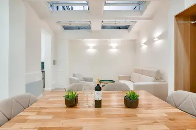 Coin salon dans l'établissement Apt 1BDR 4PAX - Saint Germain des Près