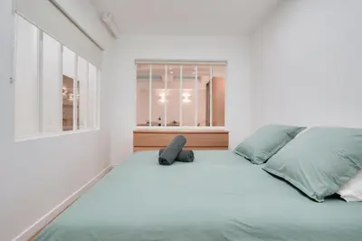 Un ou plusieurs lits dans un hébergement de l'établissement Apt 1BDR 4PAX - Saint Germain des Près