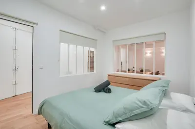 Un ou plusieurs lits dans un hébergement de l'établissement Apt 1BDR 4PAX - Saint Germain des Près