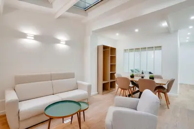 Coin salon dans l'établissement Apt 1BDR 4PAX - Saint Germain des Près