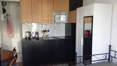 Cuisine ou kitchenette dans l'établissement Corazon de Paris