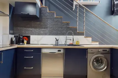 Cuisine ou kitchenette dans l'établissement Loft cosy
