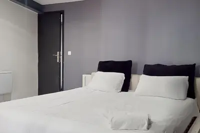 Un ou plusieurs lits dans un hébergement de l'établissement Loft cosy