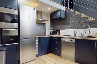 Cuisine ou kitchenette dans l'établissement Loft cosy