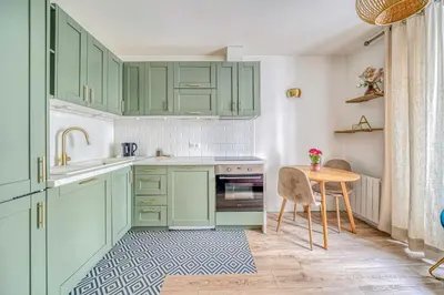 Cuisine ou kitchenette dans l'établissement Apartment in Paris 17th District