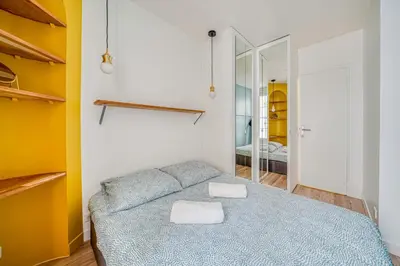 Un ou plusieurs lits dans un hébergement de l'établissement Apartment in Paris 17th District
