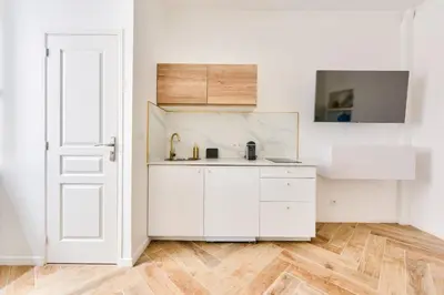 Cuisine ou kitchenette dans l'établissement Charming & modern 1BR - Paris 8