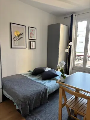 Un ou plusieurs lits dans un hébergement de l'établissement Bright studio