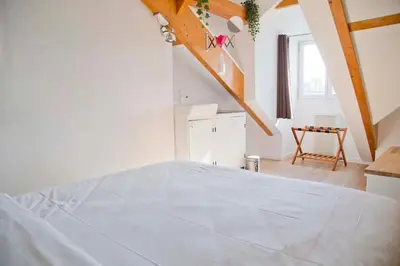 Un ou plusieurs lits dans un hébergement de l'établissement Charming Apt near Pantheon